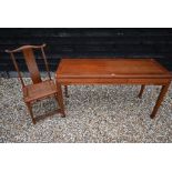 A 20th century Chinese elm desk and chair