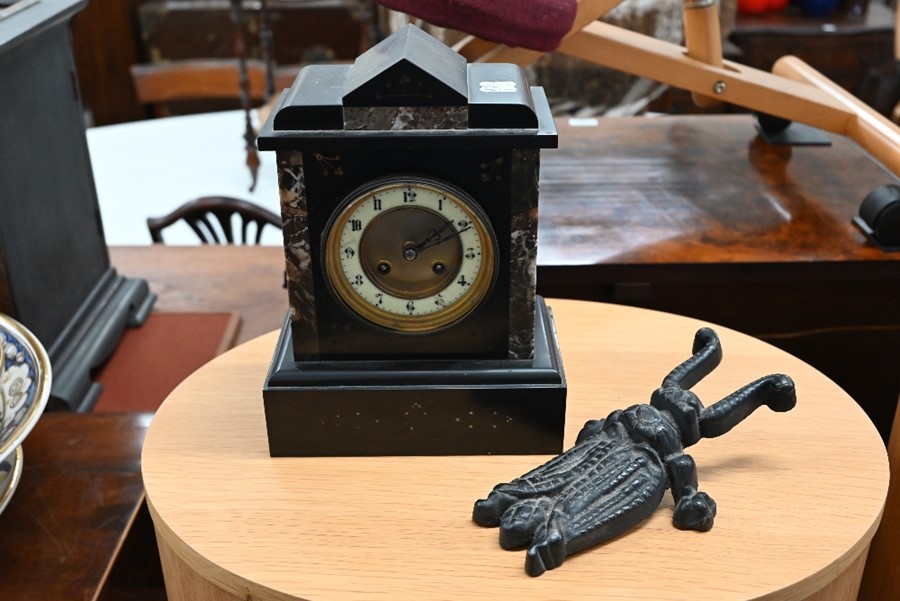 A slate clock to/w a cast iron 'beetle' boot-jack