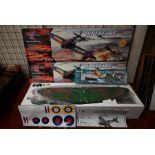 Two boxed Guanli Spitfire model gliders to/w a Revell model kit, HMS King George V