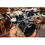 A Pearl Target Series black seven piece drum kit