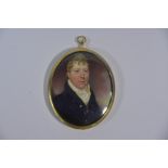A Regency oval portrait miniature on ivory of a fashionable gentleman