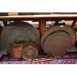 Five various 19th century and later Asian brass trays and table tops