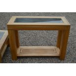 A modern light oak console table