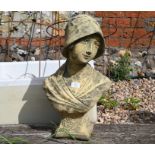 A reconstituted cast stone garden sculpture of a female bust