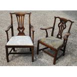 Two antique elbow chairs with fret cut splats and pad seats
