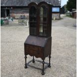 A mahogany Queen Anne style bureau bookcase