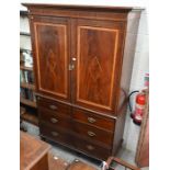 A 19th century flame mahogany and satinbanded linen press