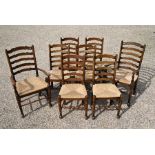 A set of eight oak ladderback dining chairs