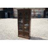 An oak bookcase cabinet