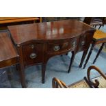 A George III mahogany serpentine form sideboard