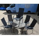 A set of six stacking garden chairs to/w a circular teak table