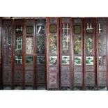 A set of nine substantial Chinese hardwood screen panels 'One Hundred Boys'