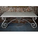 A contemporary marble top console table, raised on a scrolling wrought iron base