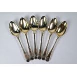 Set of six George III silver gilt feather-edge tablespoons 1766