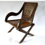 A large 19th century oak Glastonbury chair