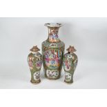 Three 19th century Chinese Canton famille rose vases, Qing dynasty