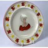 A Georgian creamware commemorative plate