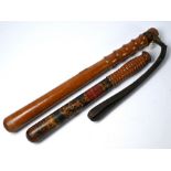 A Victorian turned and painted wood police truncheon