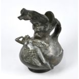 A heavy bronzed spelter jug adorned with a reclining nude female figure