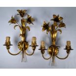 A gilt metal three branch leaf form ceiling light fitting