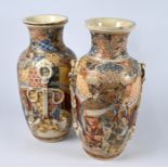 A pair of Japanese Meiji period Satsuma style baluster vases, 32 cm high