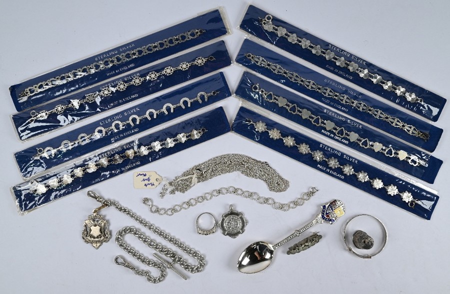 A collection of silver and white metal jewellery
