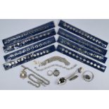 A collection of silver and white metal jewellery