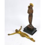 A brass figure of the crucified Christ