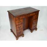 A 19th century mahogany knee-hole desk