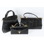 Three black handbags