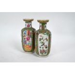 A pair of 19th century Chinese Canton famille rose rouleau vases