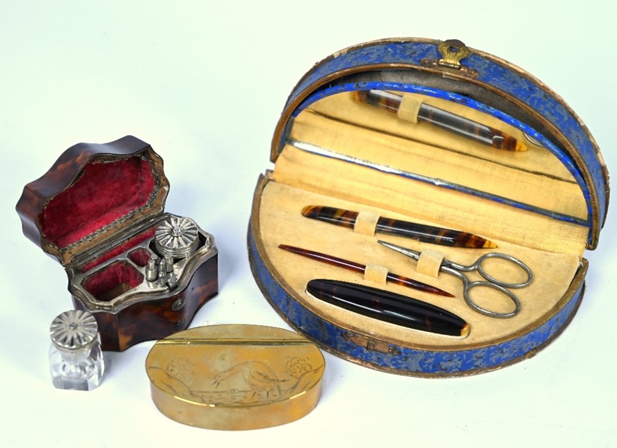 A 19th century Continental tortoiseshell writer's necessaire with white metal mounts