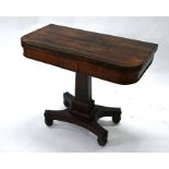 A Victorian rosewood card table