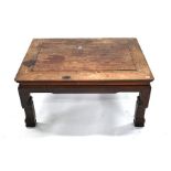 An early 20th century Chinese hardwood low Kang table