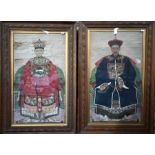 A pair of 19th century Chinese ancestor portraits of court officials, Qing dynasty