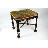 A 19th century Chippendale design mahogany stool