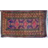 A Belouch rug, brown/red