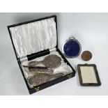 Edwardian silver photograph frame, brush set, etc.