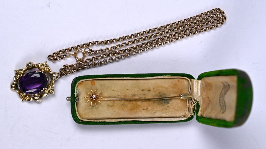 A Victorian amethyst-set pendant and diamond set stick pin