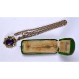 A Victorian amethyst-set pendant and diamond set stick pin