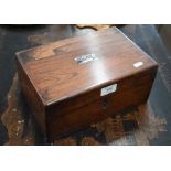 A 19th century rosewood work-box with mother of pearl inlay and fitted interior