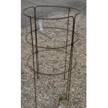 A pair of weathered steel curved garden plant frames