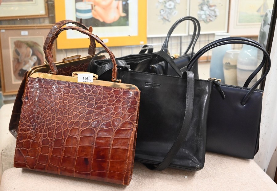 Three vintage leather handbags
