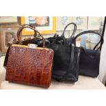 Three vintage leather handbags