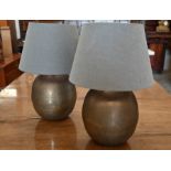 Three copper lamp bases