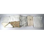 A mixed box of various table linens