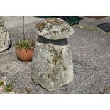 An antique hand cut staddle-stone with composite cap