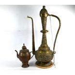 A Moorish brass ewer lamp and copper kettle (2)