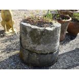 A two part cast stone planter