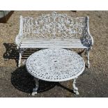 An old Victorian style metal garden bench and similar style low table (2)